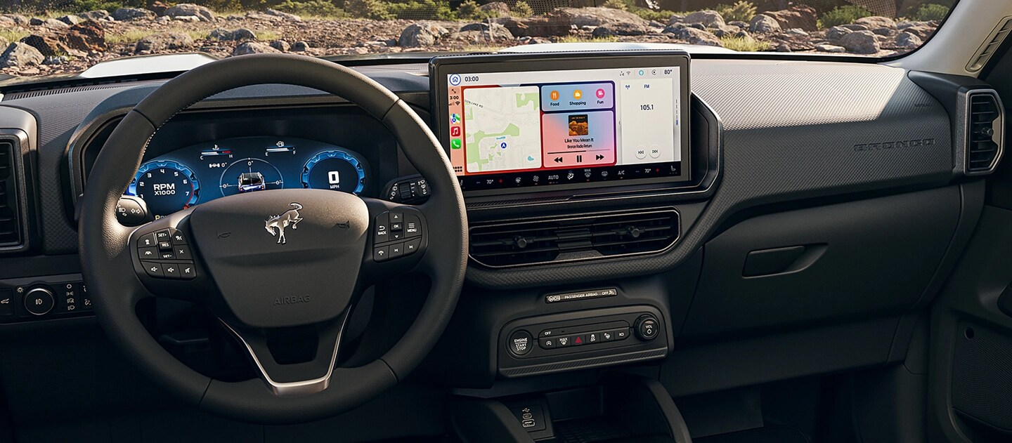 2025 Ford Bronco Sport® interior showing steering wheel, centre touchscreen and instrument panels