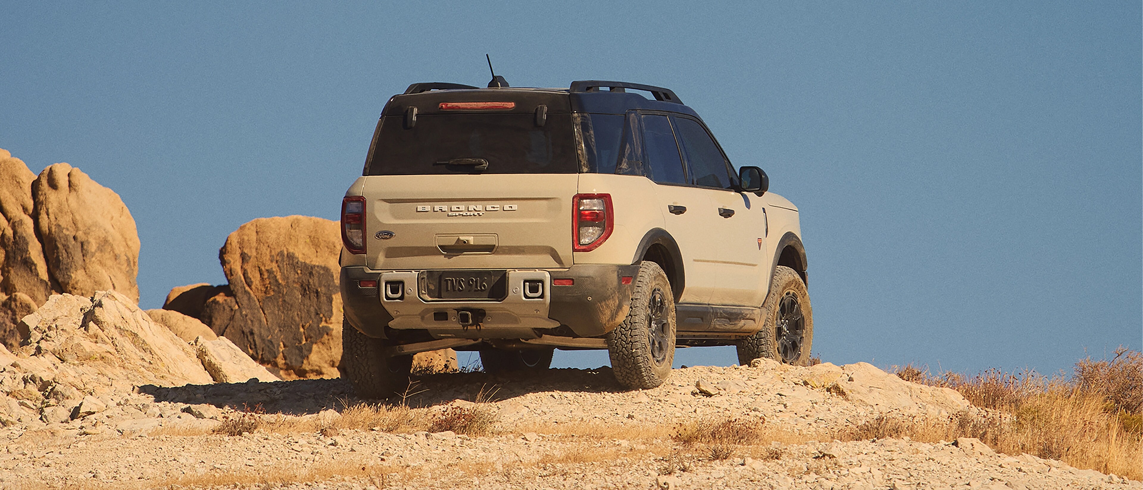 2025 Ford Bronco Sport® Badlands® model being driven over rocky terrain