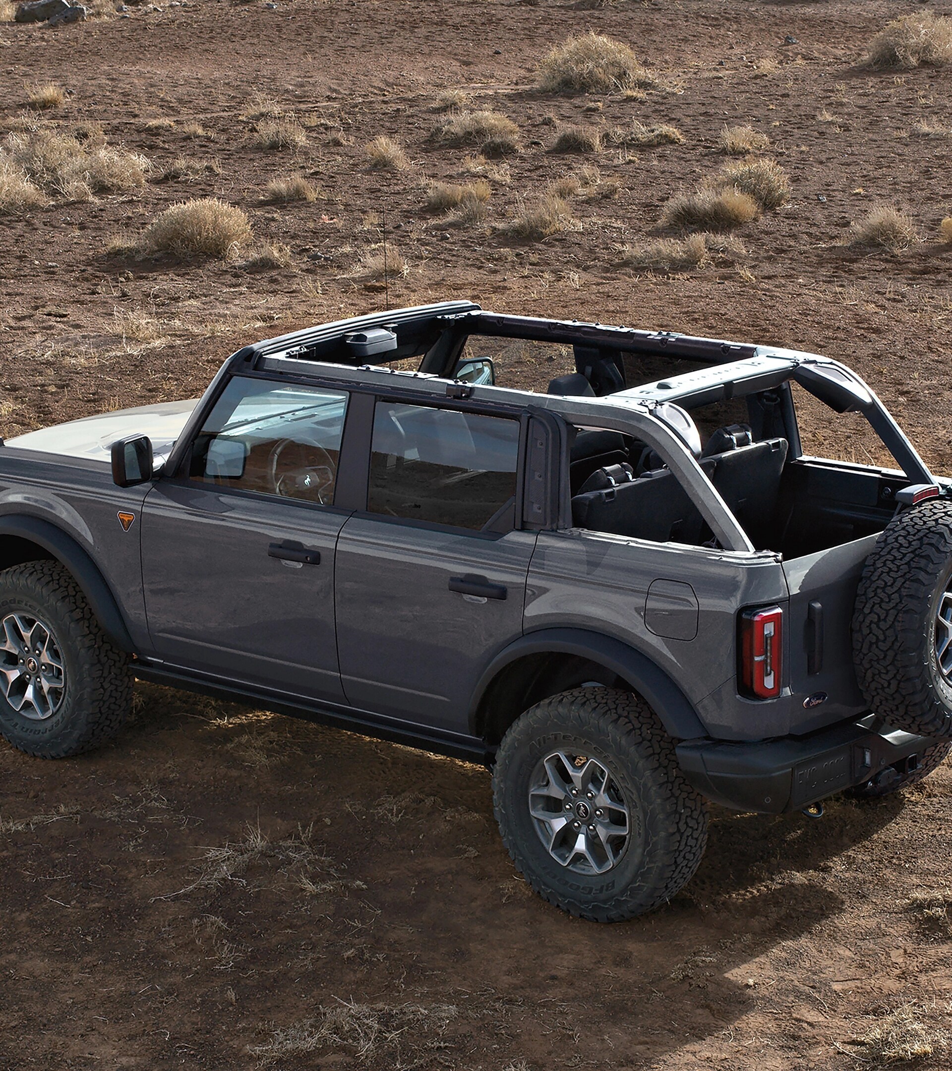 A 2026 Ford Bronco® SUV with the soft top folded back / the hard top removed