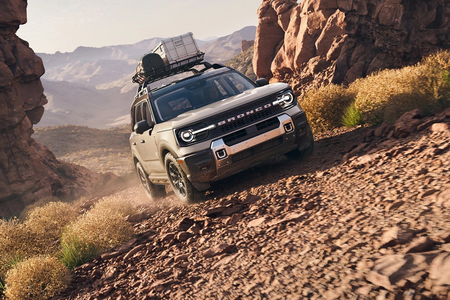 Bronco Sport driving on gravel uphill.