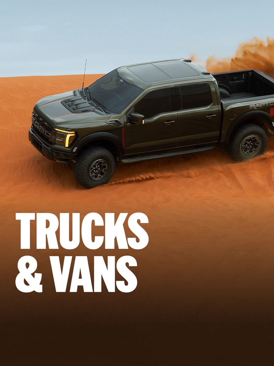 Ford trucks and vans driving on varying terrain. “Trucks and Vans”.