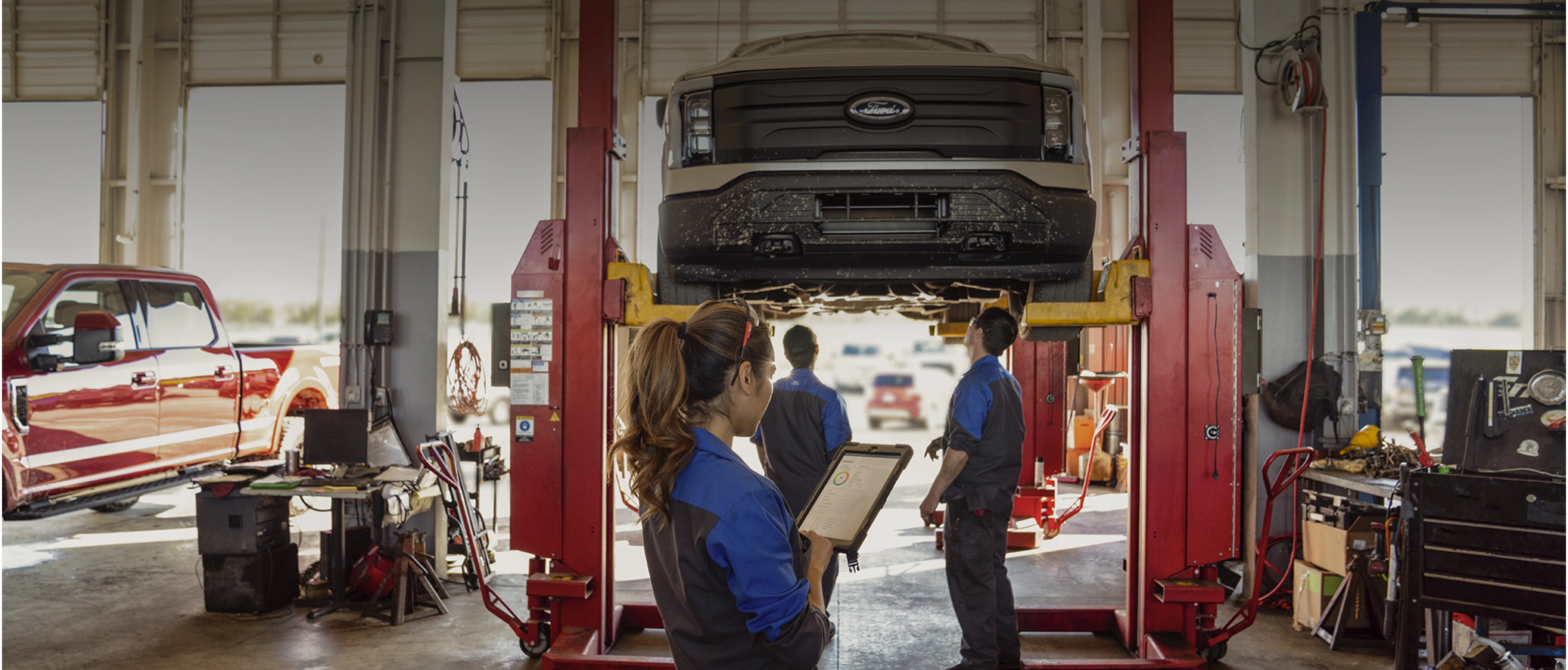 Technicians working in a Ford Service Centre.