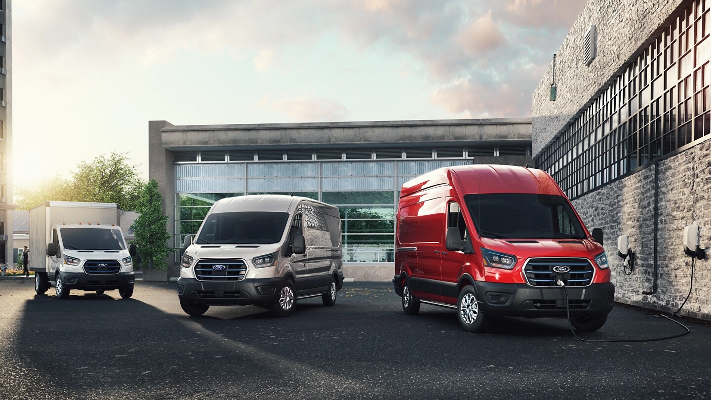 Three 2025 Ford E-Transit™ vehicles parked in a business lot