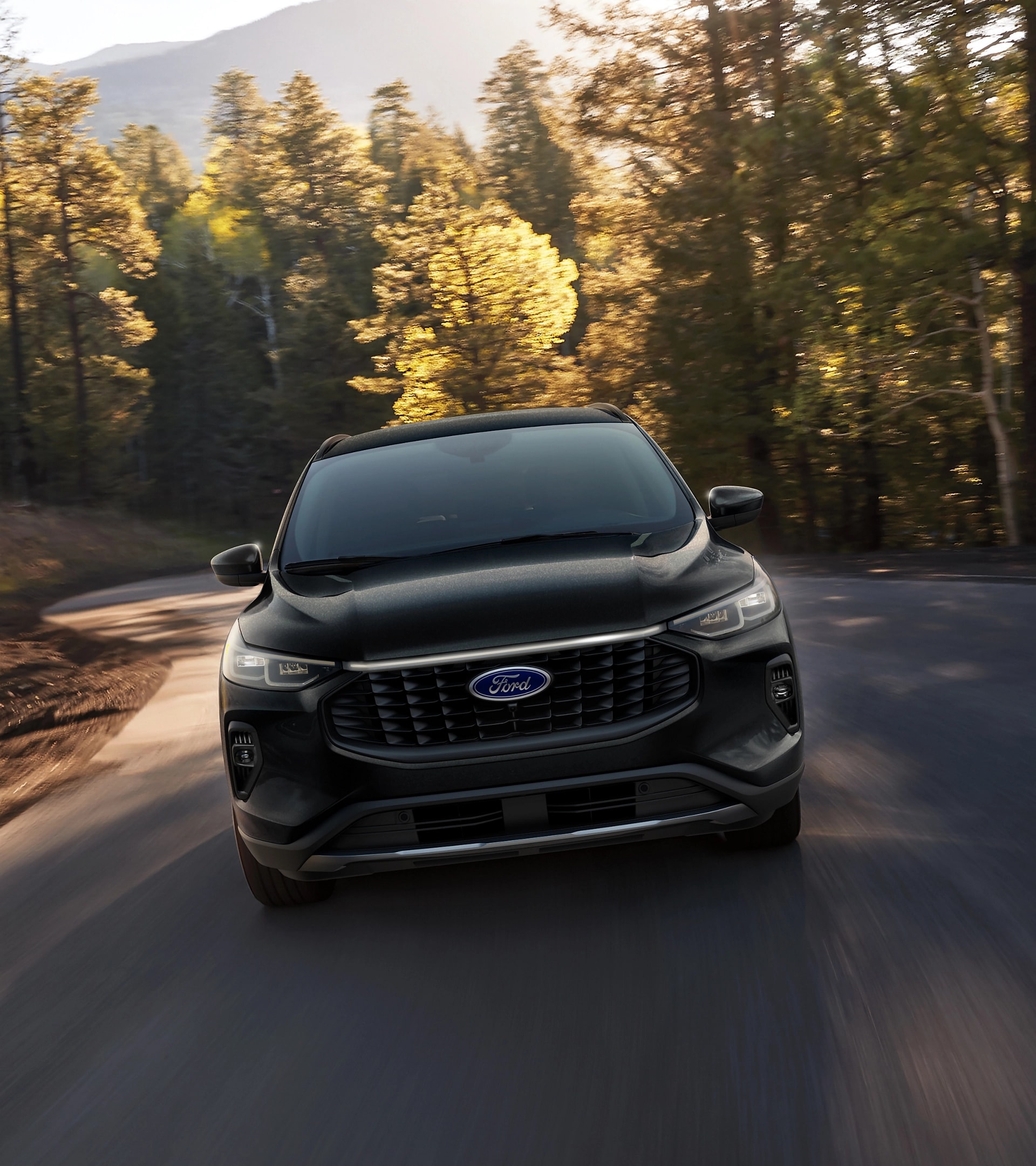 2026 Ford Escape® SUV being driven toward the camera on a highway