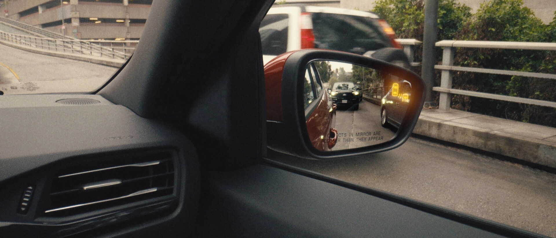 Close-up of the sideview mirror of a 2026 Ford Escape® SUV