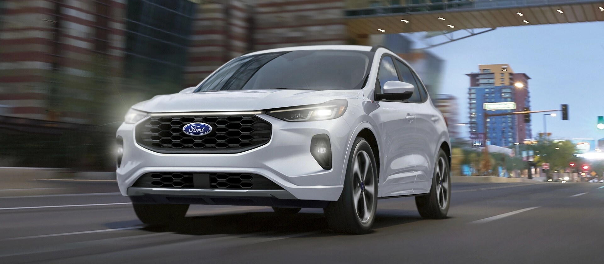 2026 Ford Escape® SUV being driven on a city street