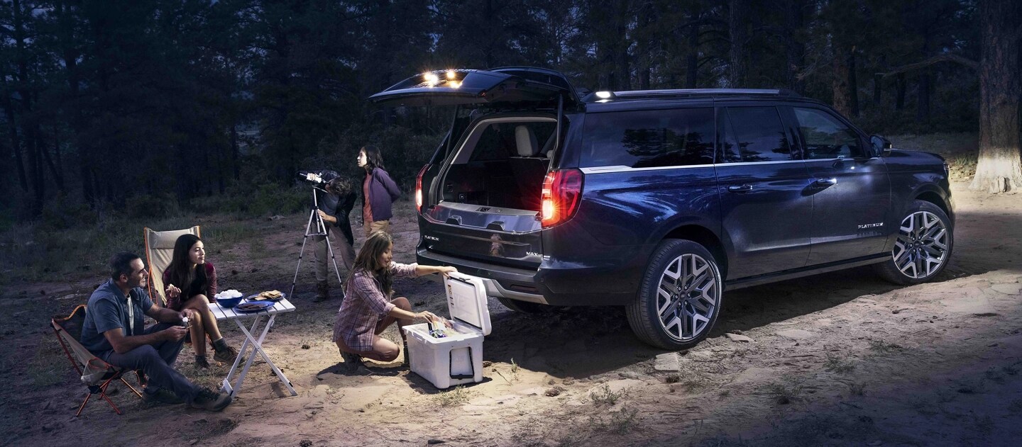 2025 Ford Expedition® SUV with available 360-Degree Zone Lighting with people nearby