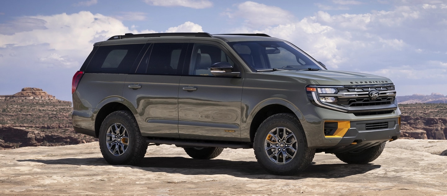 A 2025 Ford Expedition® Tremor® parked on a rocky outcrop