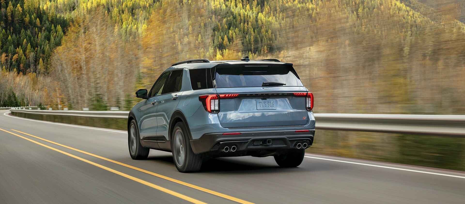 A 2026 Ford Explorer® SUV driving on a mountain highway