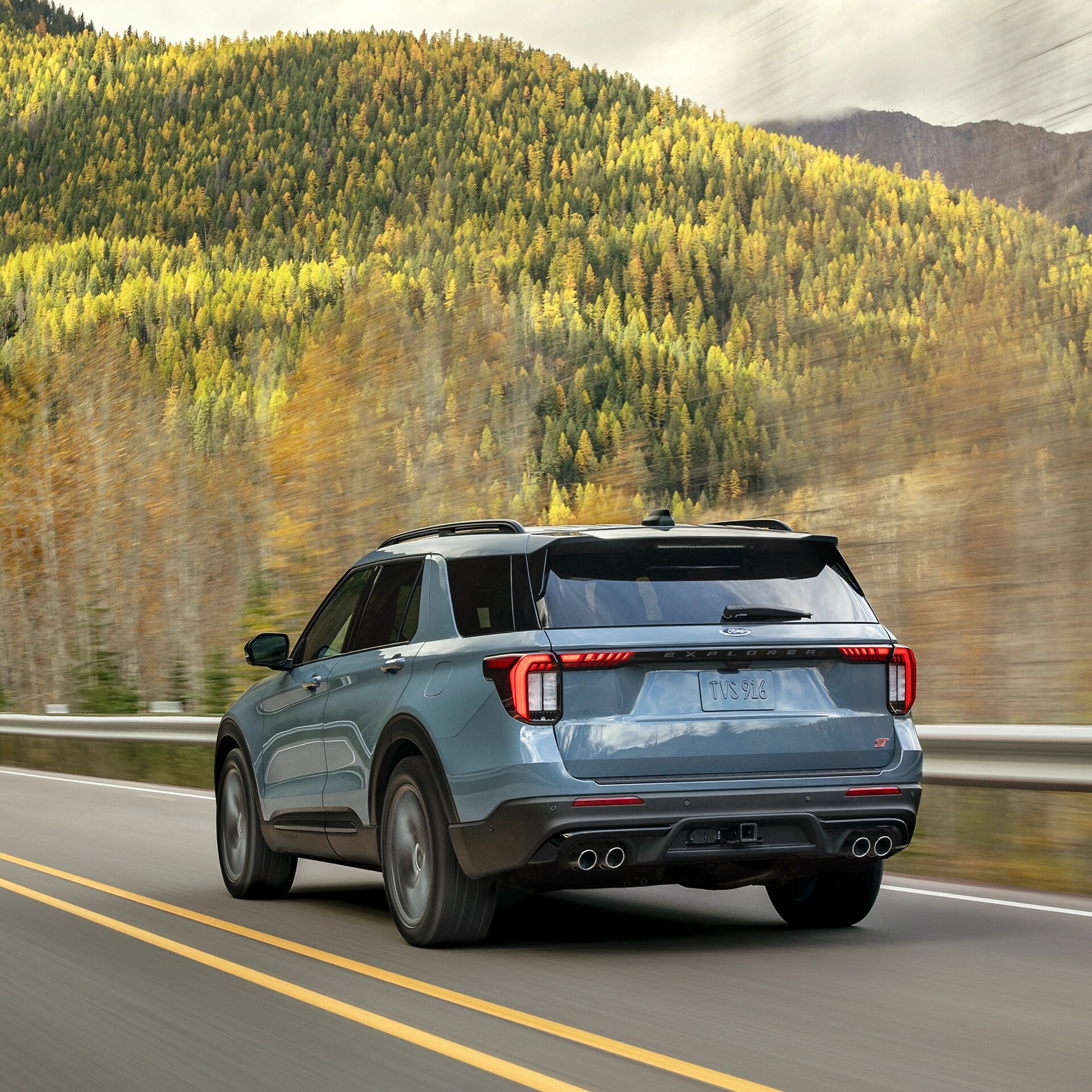 A 2026 Ford Explorer® SUV being driven on a mountain highway