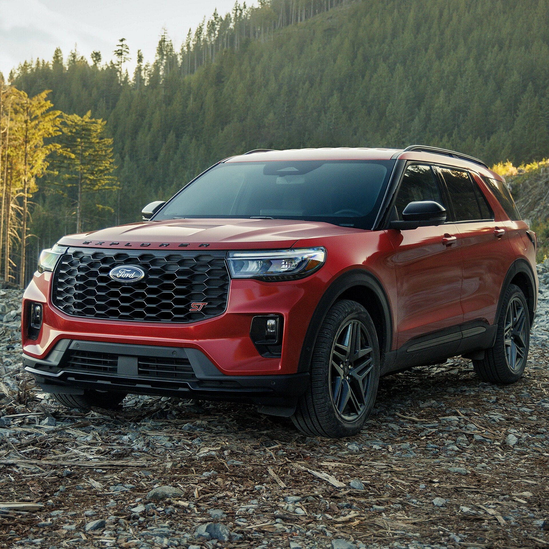A red 2026 Ford Explorer® parked outside on a fall day