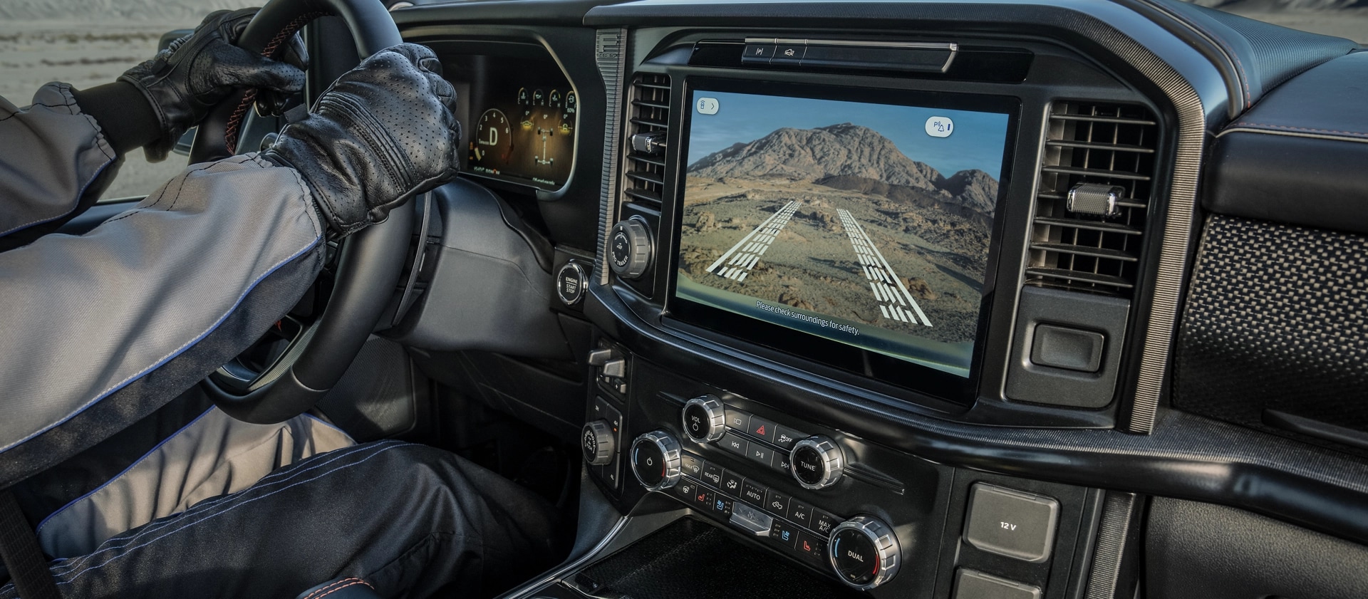 Interior of a 2025 Ford F-150® Raptor® truck showing the 12" display screen