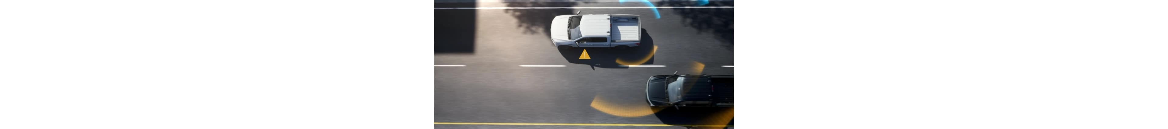 An aerial view of a 2025 Ford F-150® Lightning® being driven on a highway