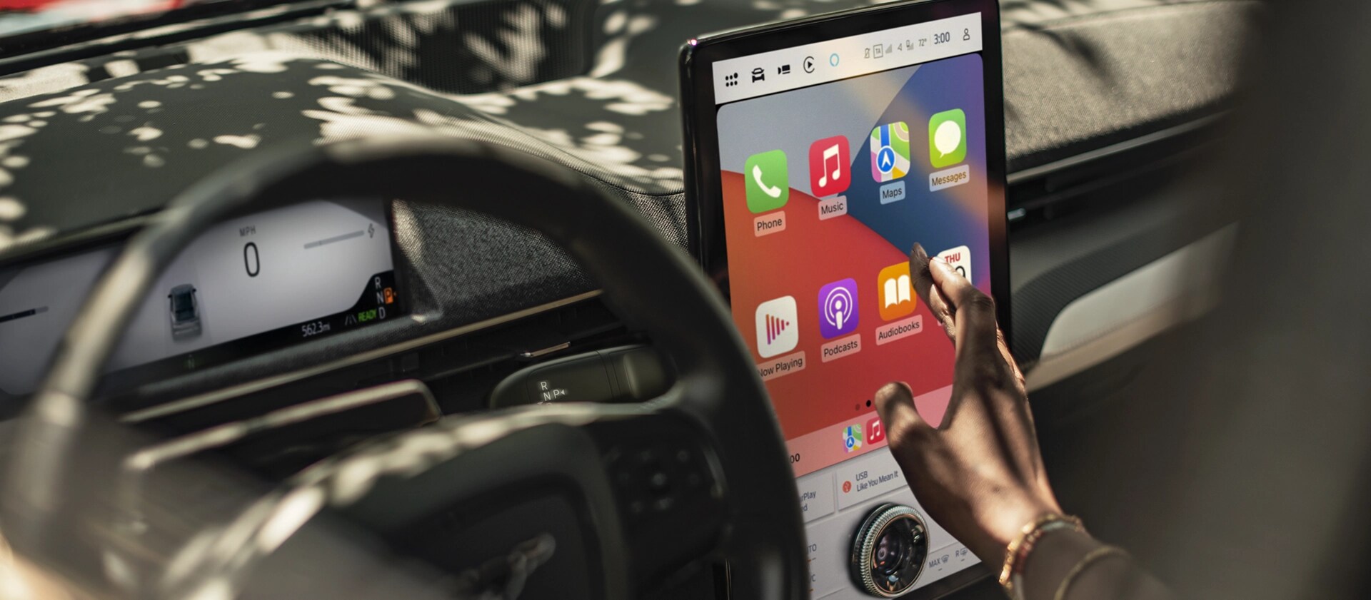 Steering wheel and touchscreen in a 2025 Ford Mustang Mach-E®