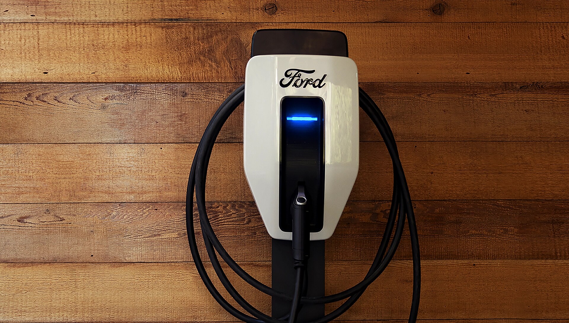 Ford Charge Station Pro installed on a wall