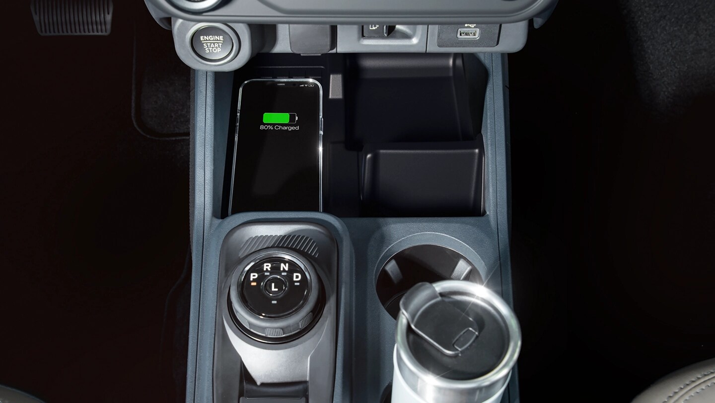 A closeup of the wireless charging pad on a 2025 Ford Maverick® pickup