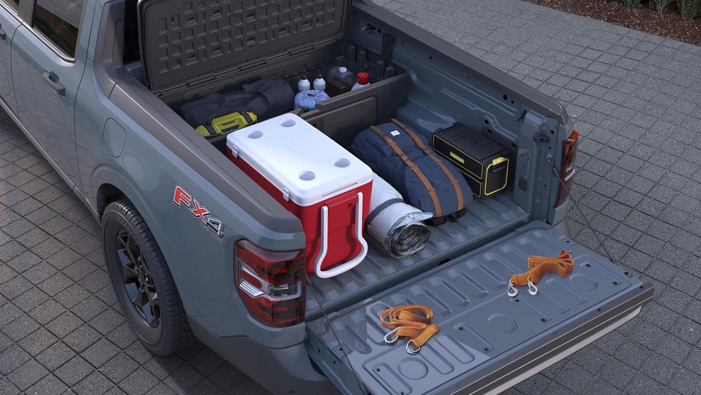 The cargo bed of a 2025 Ford Maverick® XLT pickup, showing the FLEXBED® Storage System