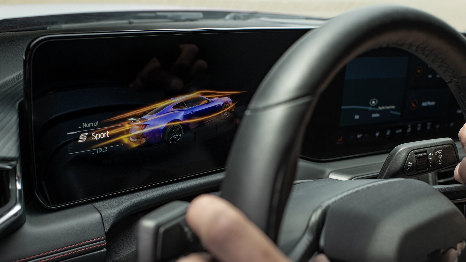 Person driving a 2025 Ford Mustang® coupe