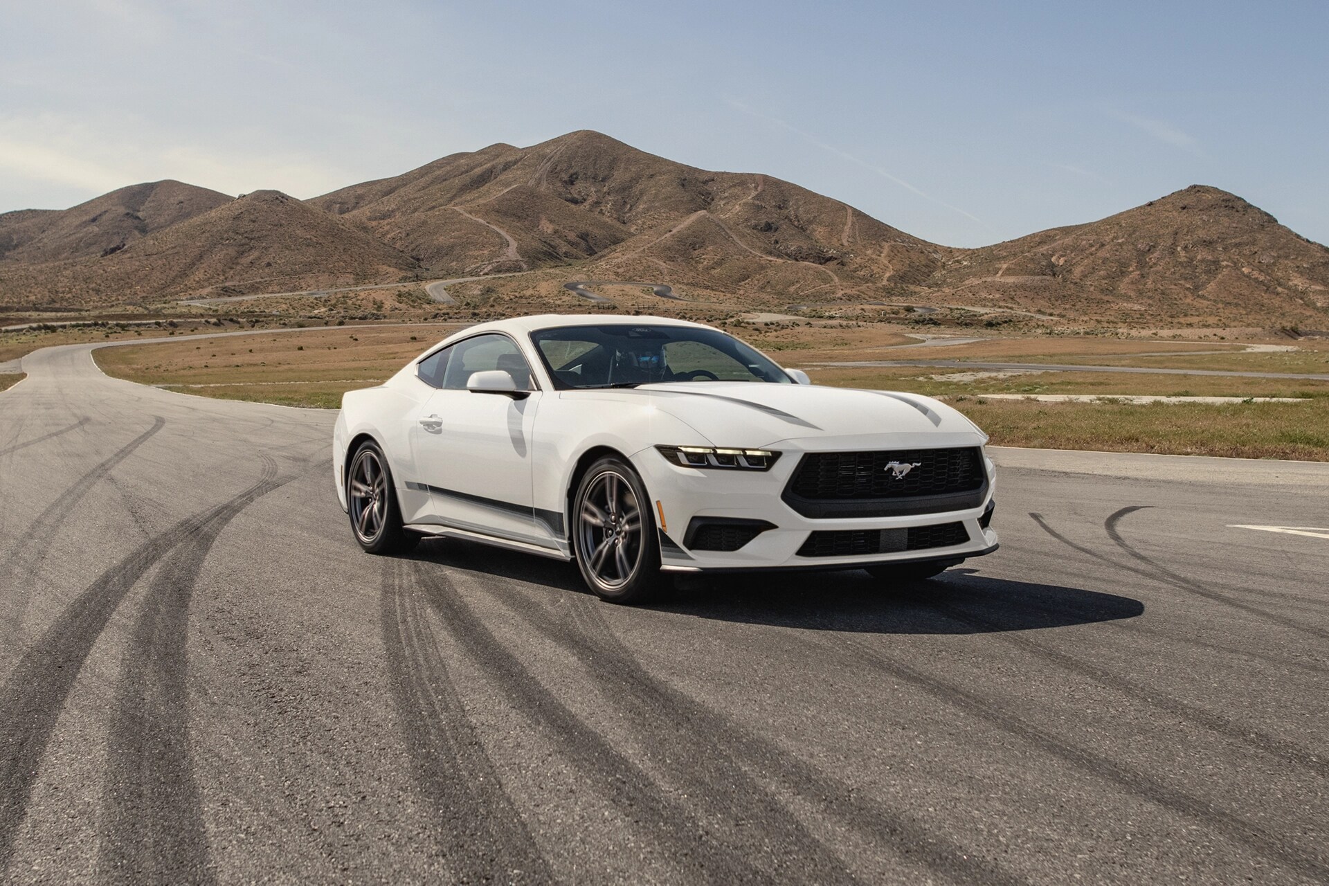 2025 Ford Mustang® EcoBoost® coupe parked on a racecourse