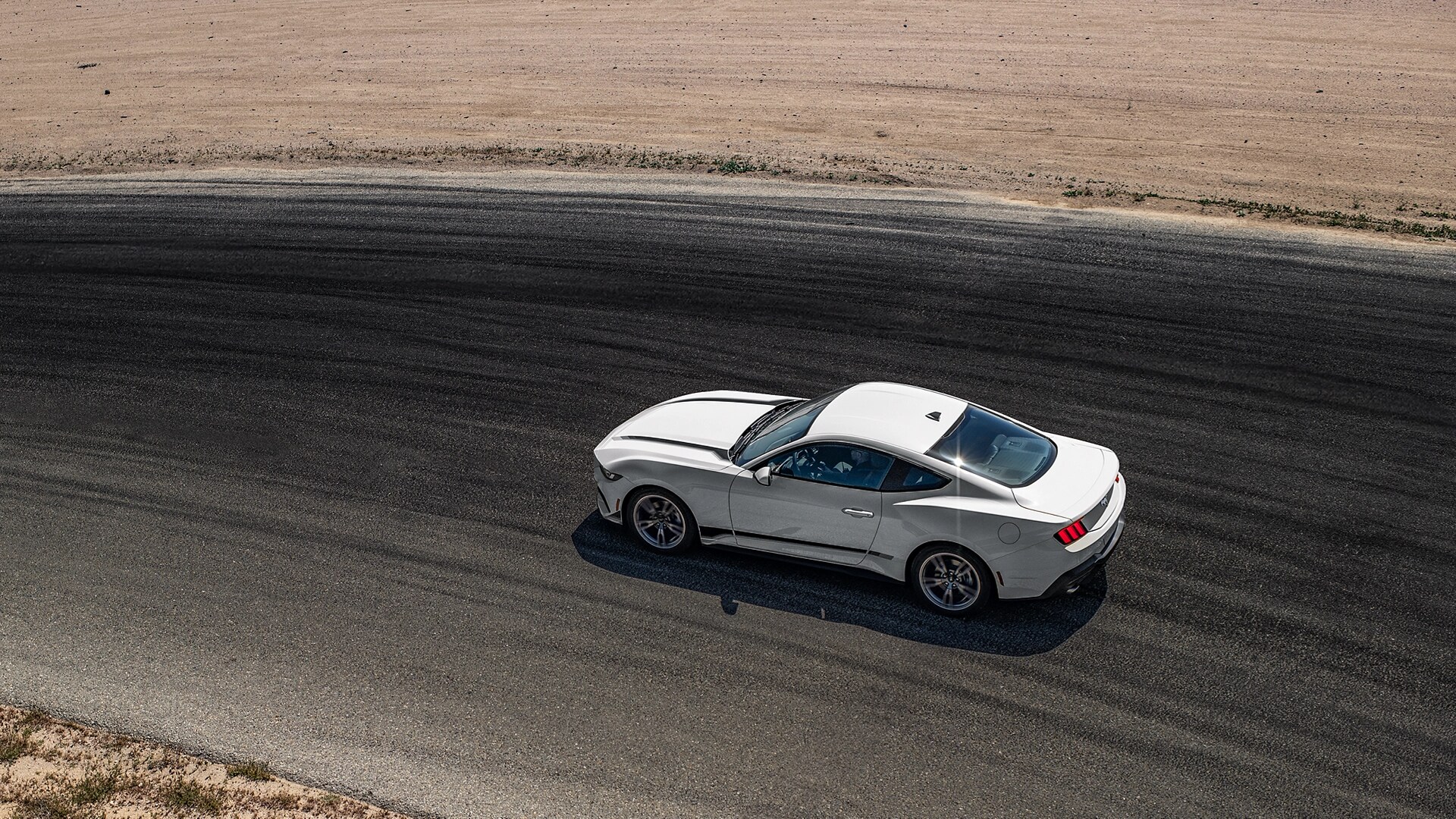 2025 Ford Mustang® coupe being driven on a track in the desert