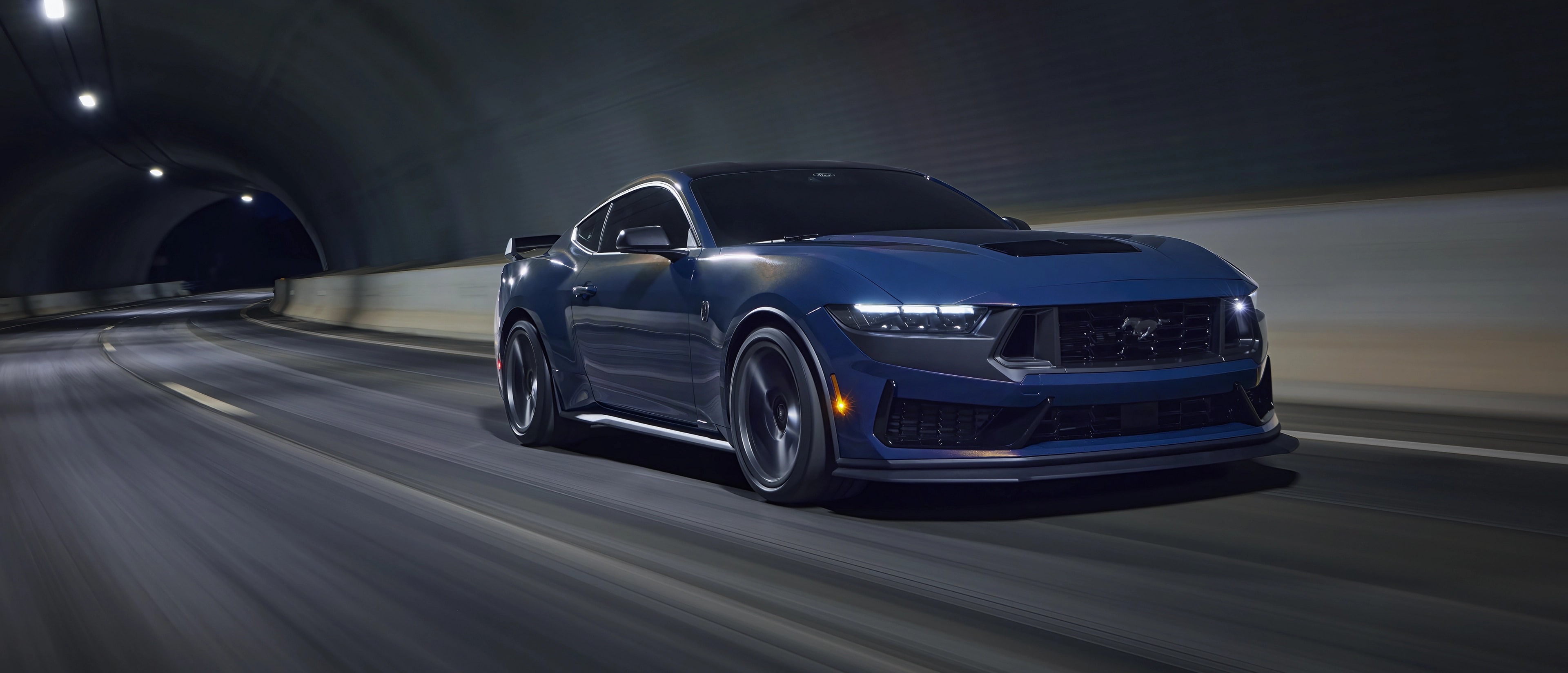 2025 Ford Mustang® Dark Horse™ being driven in a tunnel