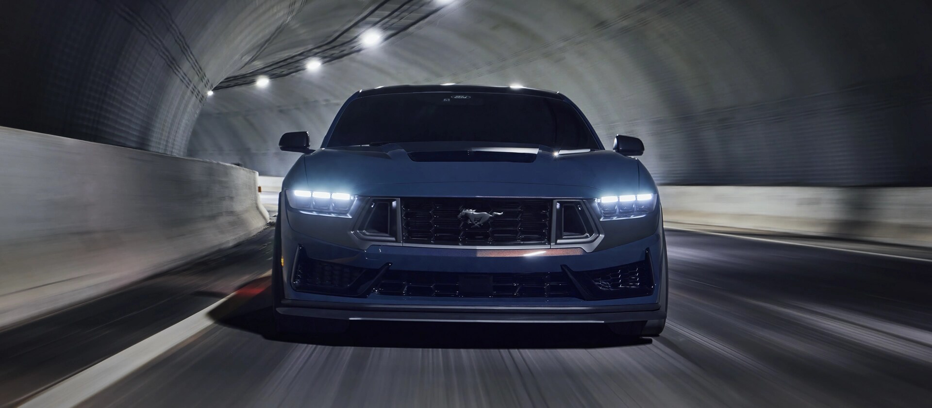 2025 Ford Mustang® Dark Horse™ being driven in a tunnel