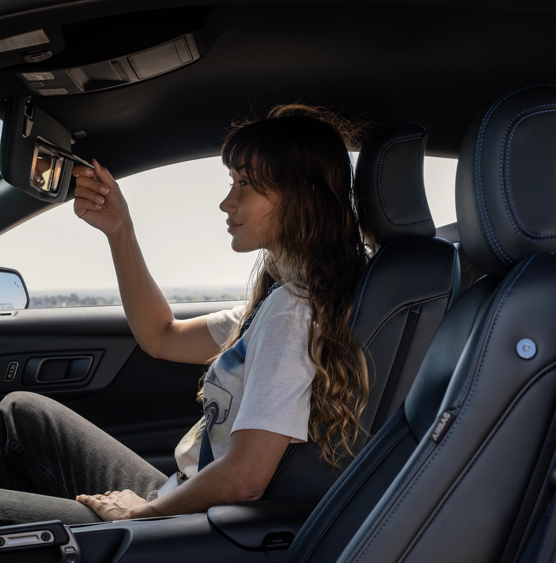 Person sitting in a 2026 Ford Mustang® fastback