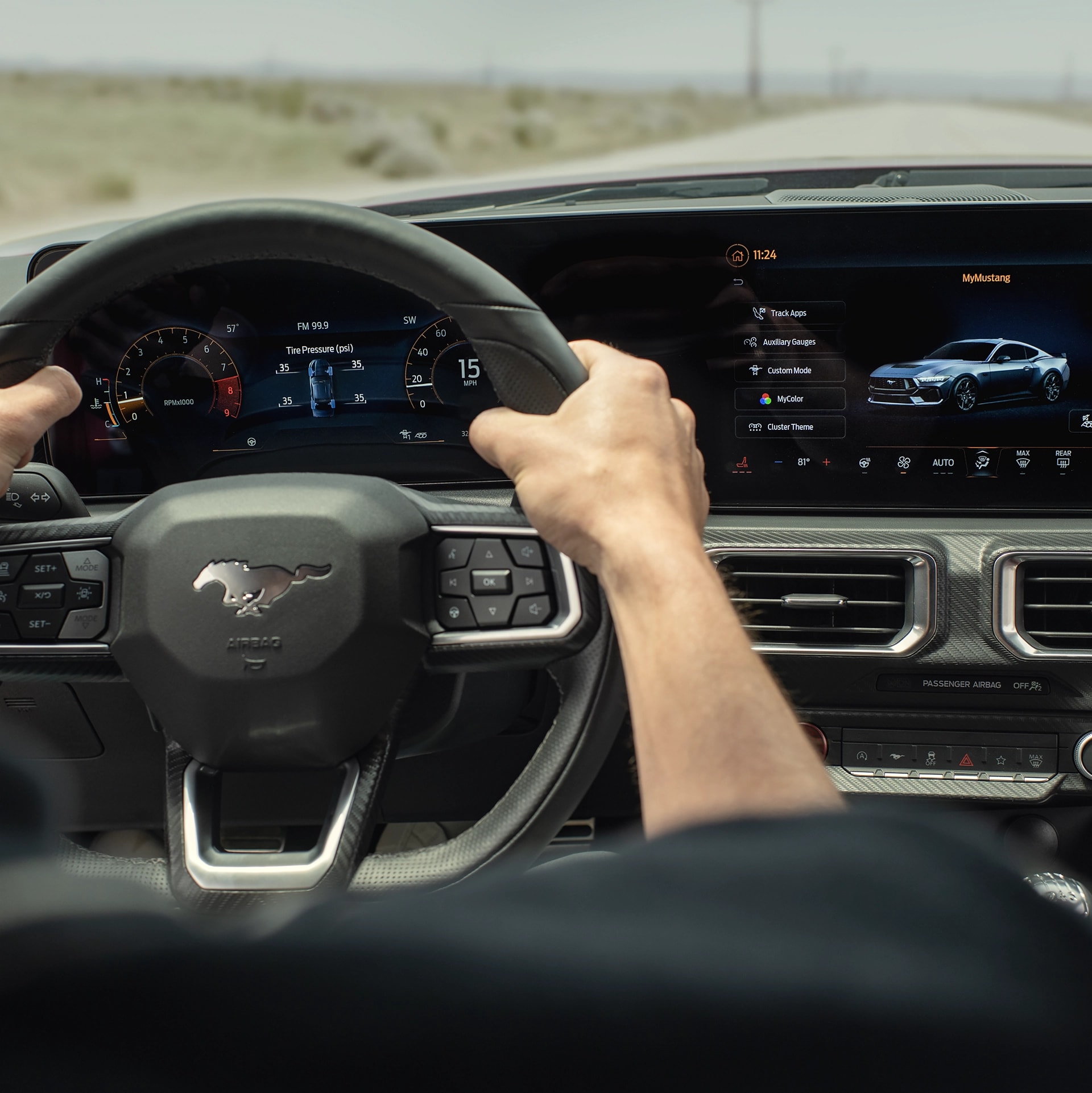 Person driving a 2026 Ford Mustang® fastback