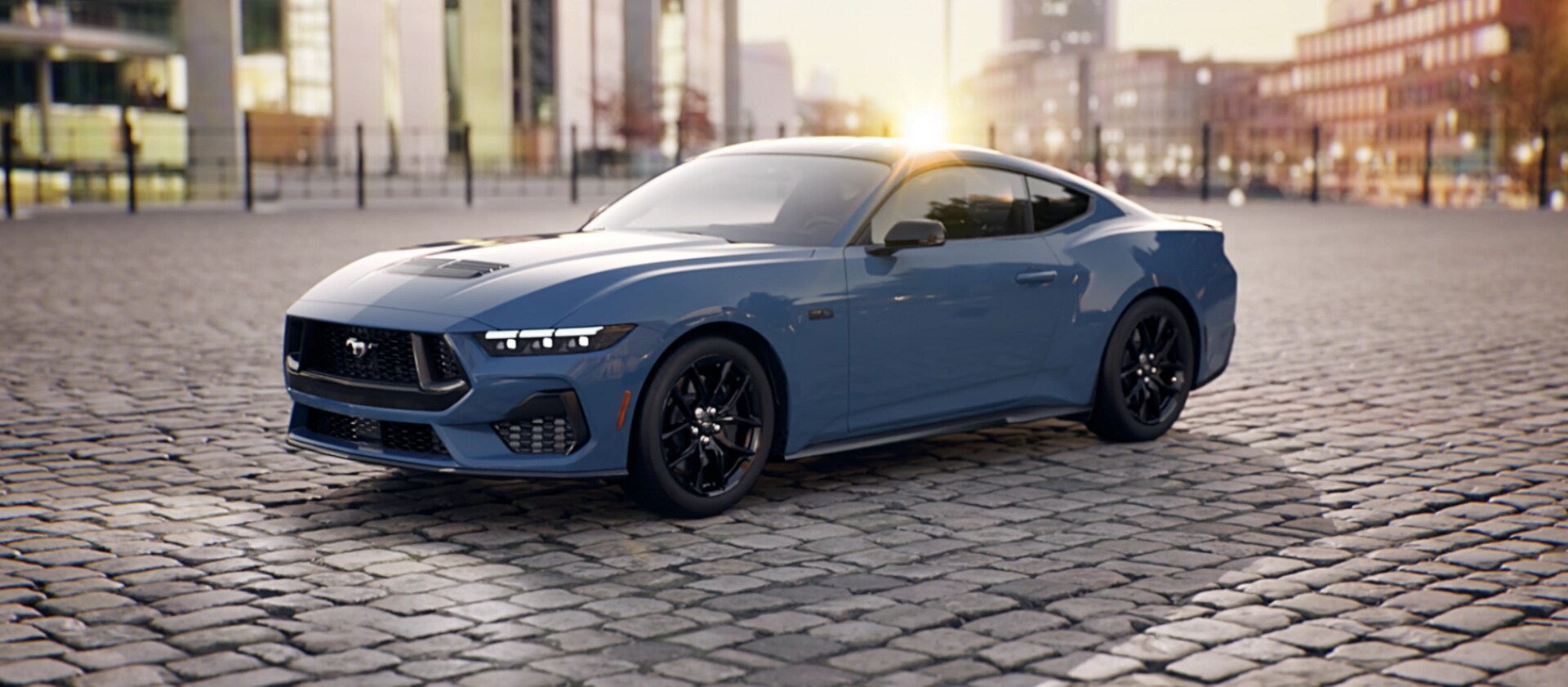 A 2026 Ford Mustang® GT Premium fastback parked in a downtown plaza