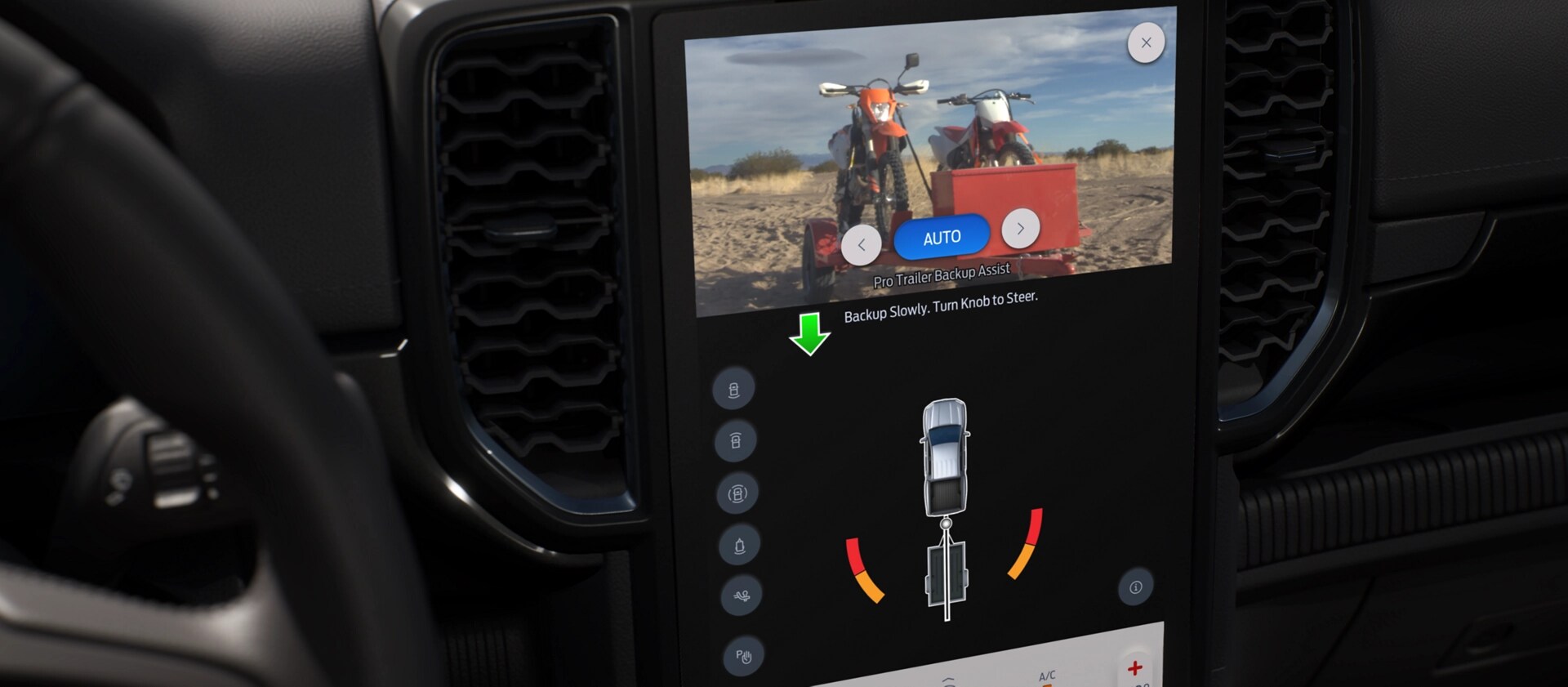 Interior photo showing 2025 Ford Ranger® rearview camera view and towing instructions