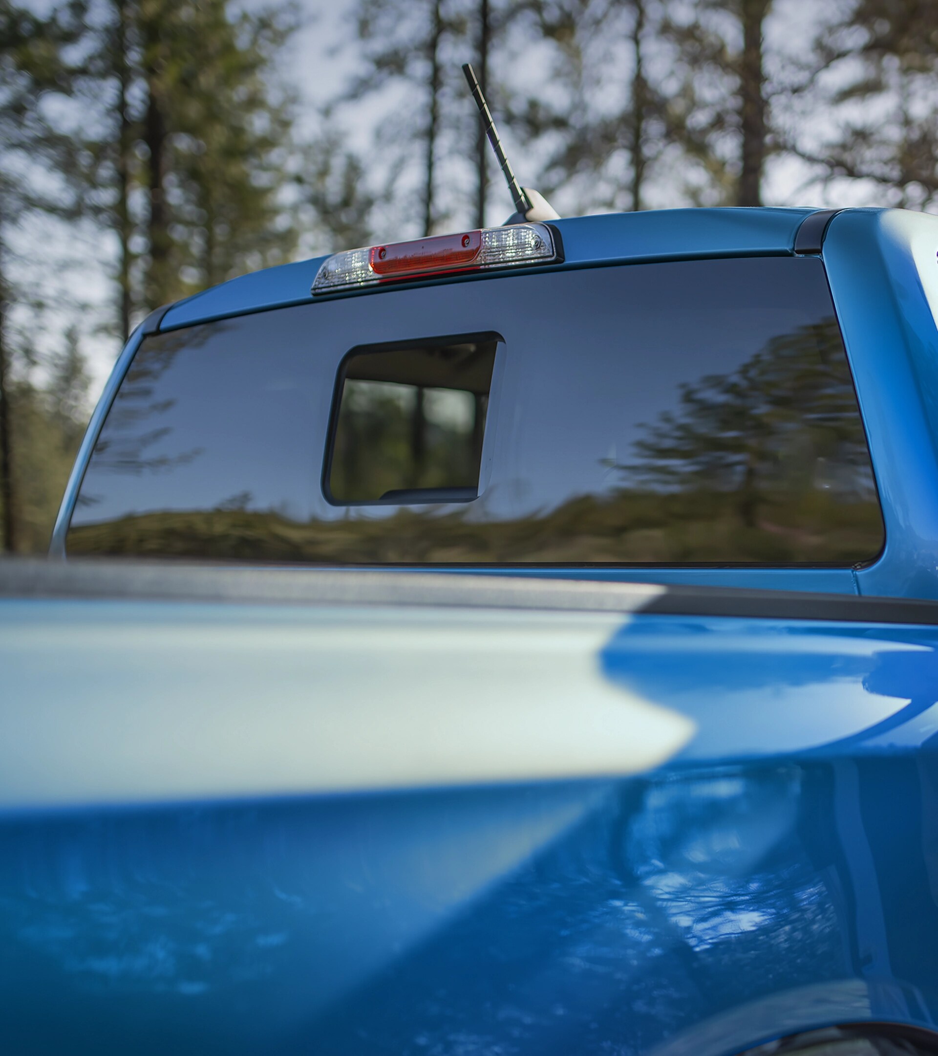 Exterior shot of the 2025 Ford Ranger® automatic rear window open