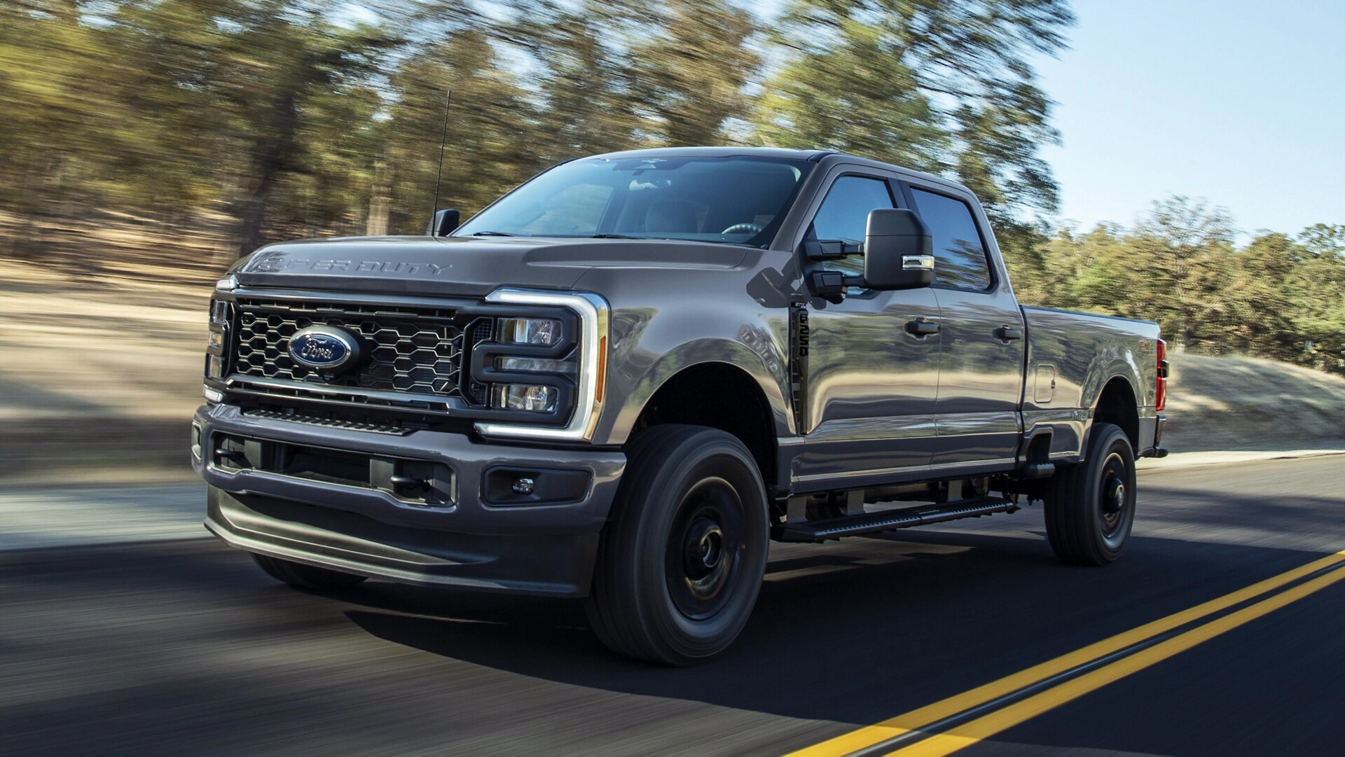2026 Ford Super Duty® F-250® with the STX® Appearance Package driving on a paved road