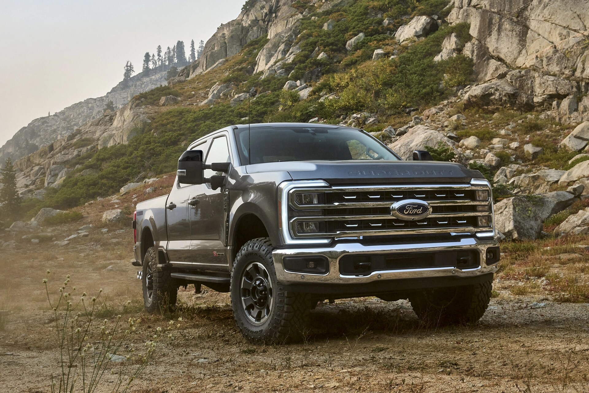 2026 Ford Super Duty® F-250® with the Tremor® Off-Road Package parked on a rocky mountain road