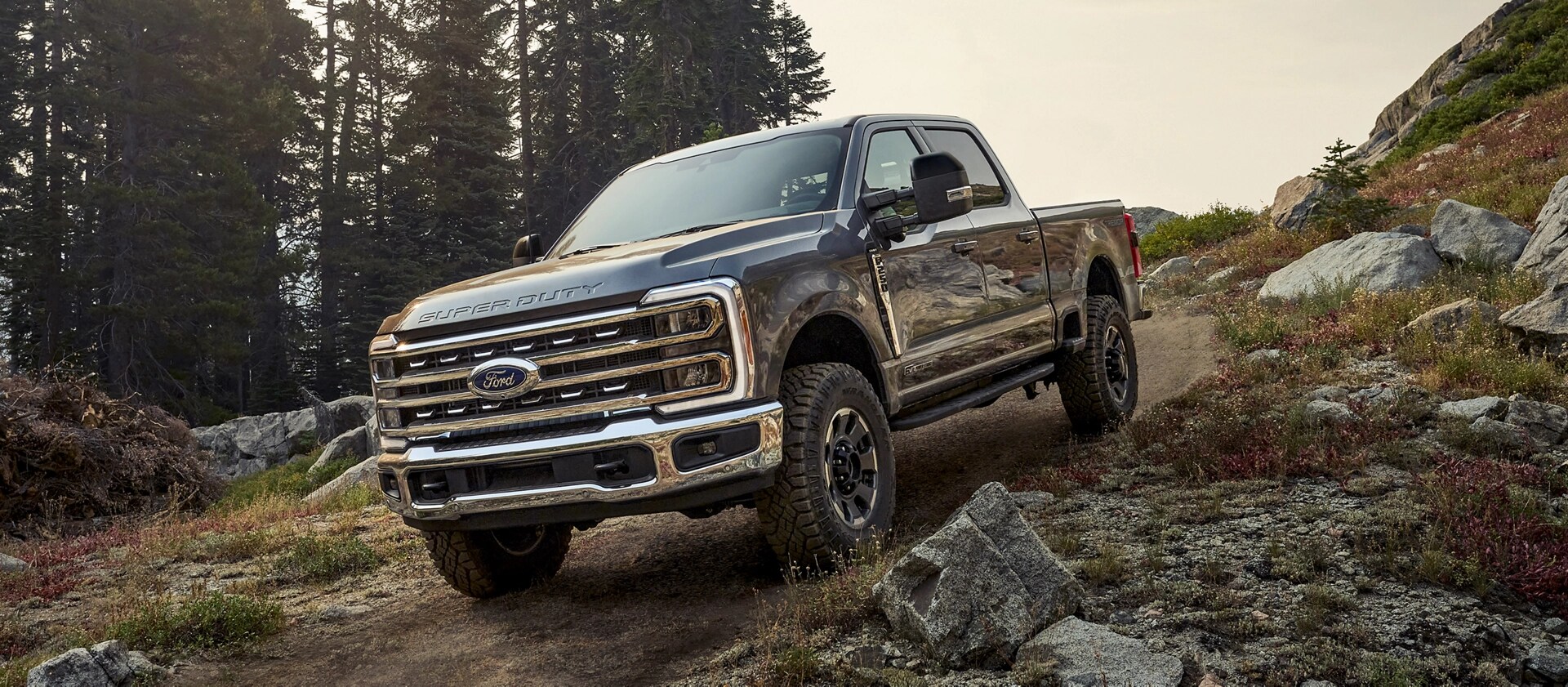 2026 Ford Super Duty® F-250® with the Tremor® Off-Road Package parked on a rocky mountain side
