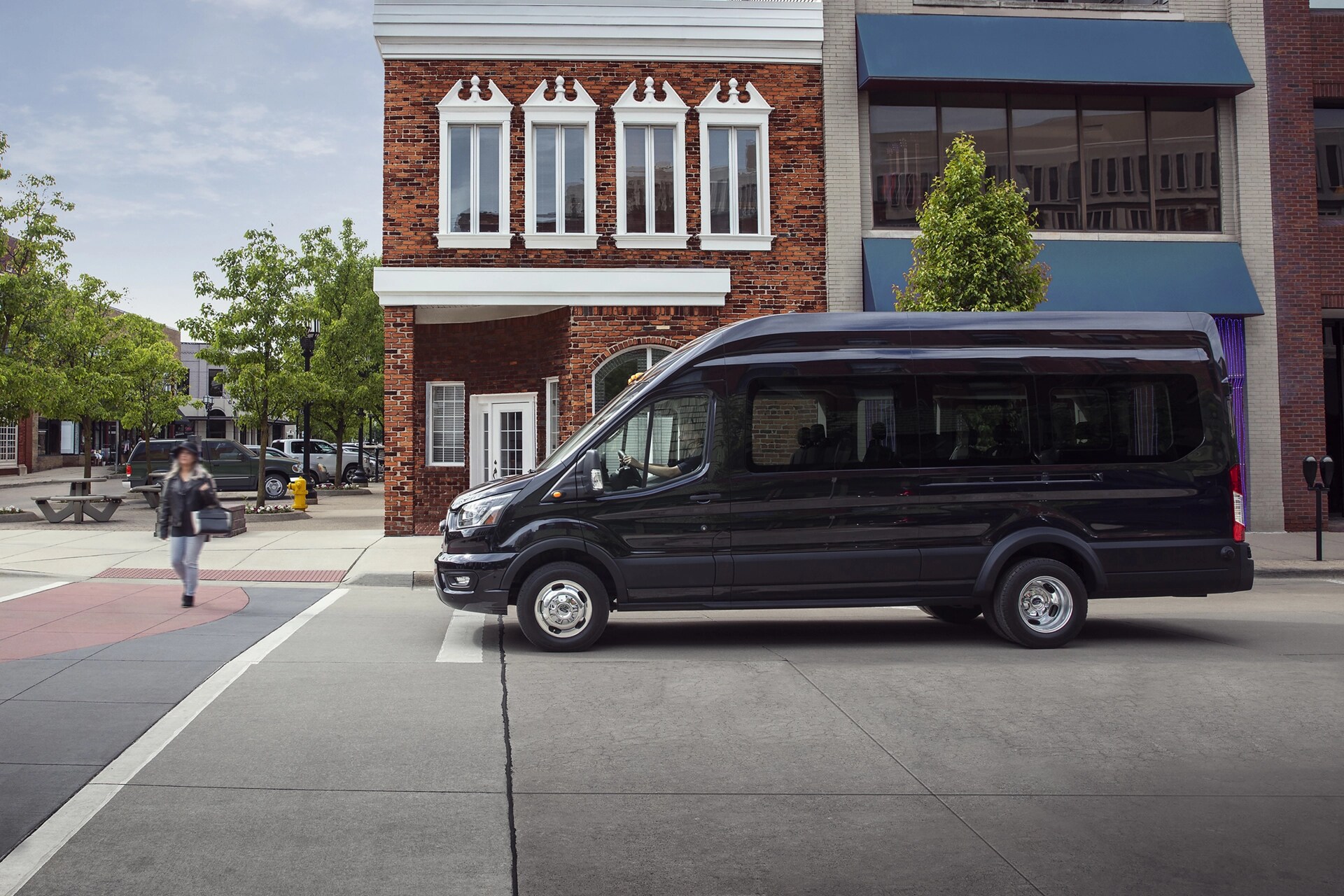 A 2025 Ford Transit® Van stopped at an intersection