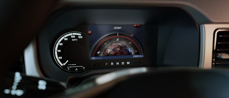 Close-up of 2023 Ford Bronco® instrument cluster showing Sport mode