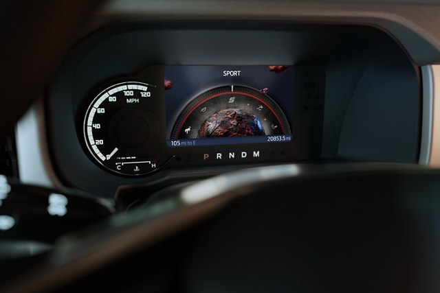 Close-up of 2023 Ford Bronco® instrument cluster showing Sport mode
