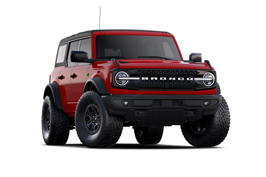 Four-door 2023 Ford Bronco® Wildtrak™ shown in Race Red