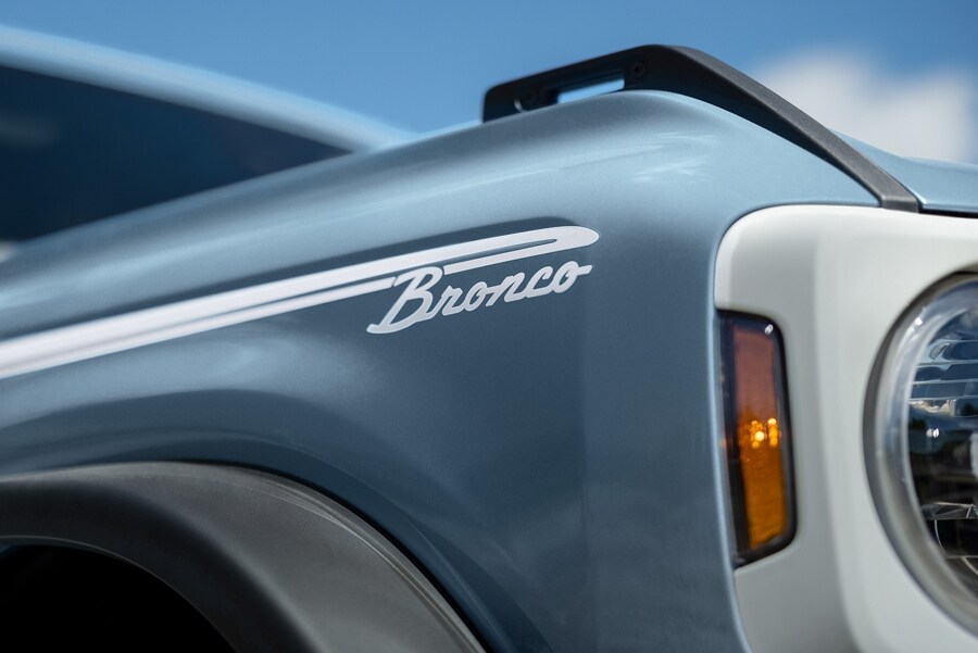 Close-up of a 2023 Ford Bronco® Heritage model fender in Azure Grey Metallic Tri-Coat