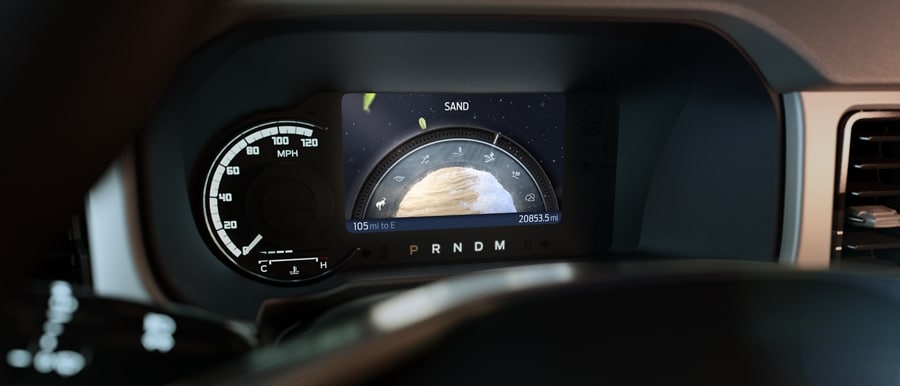 Close-up of 2024 Ford Bronco® instrument cluster showing Sand mode