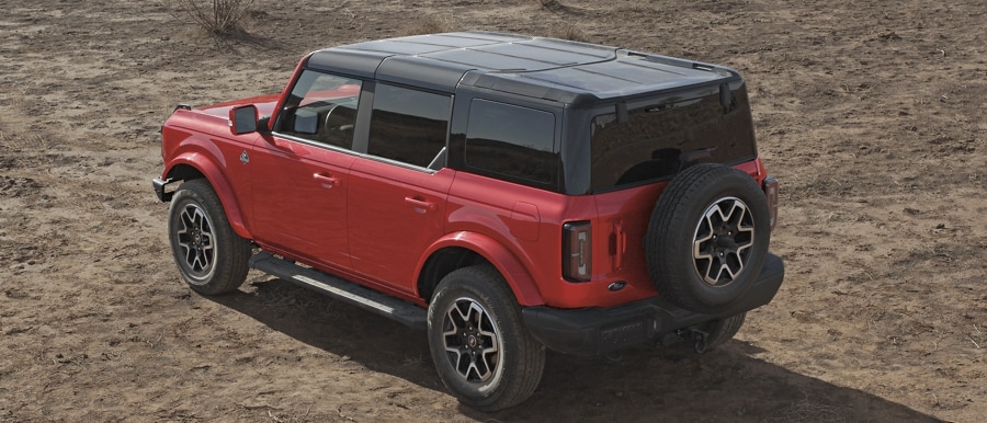4-door 2024 Ford Bronco® Outer Banks™ model shown in Race Red with hardtop