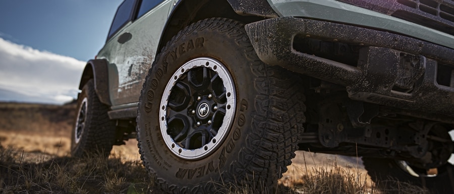 2-door 2024 Ford Bronco® Black Diamond™ in Cactus Grey with available heavy-duty modular front bumper
