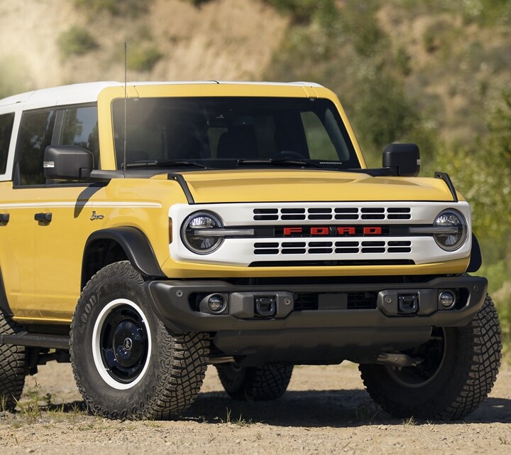 Photo of a 2024 Ford Bronco® Heritage® Limited Edition in Yellowstone Metallic in the desert