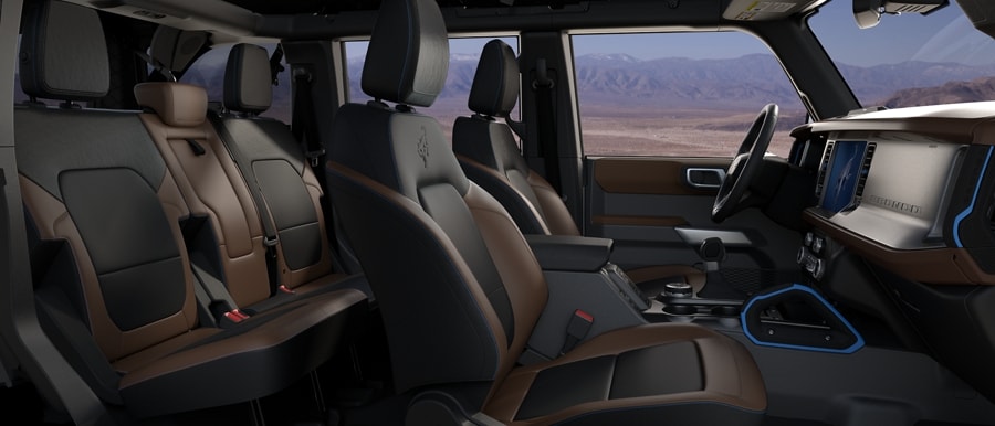 Interior of 2024 Ford Bronco® SUV with available leather-trimmed seats in Roast with Black Onyx