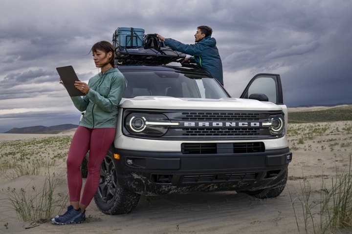 2023 Ford Bronco® Sport SUV shown with two people standing outside the vehicle