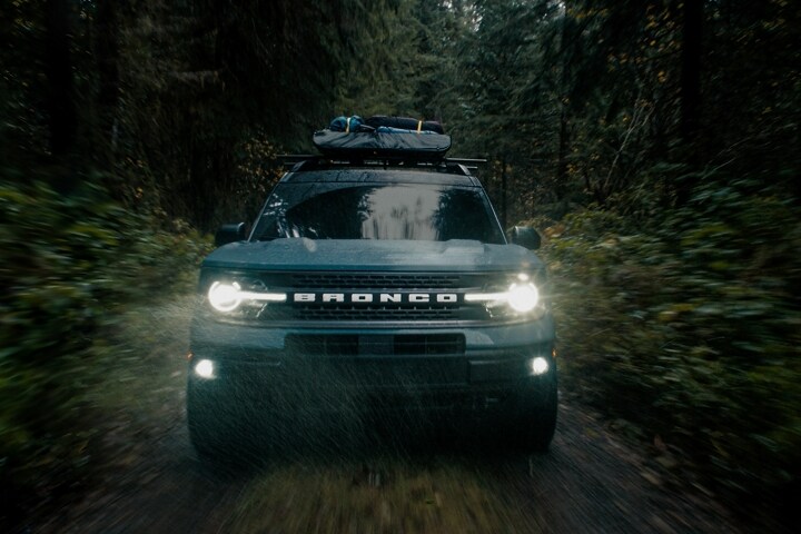 2023 Ford Bronco® Sport SUV being driven on a dirt trail through the woods