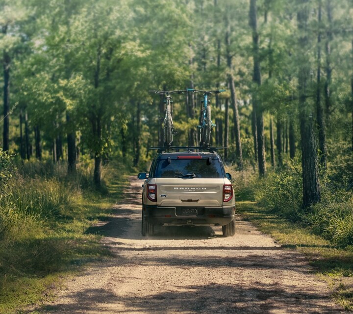 A 2024 Ford Bronco® Sport SUV being driven on a dirt road