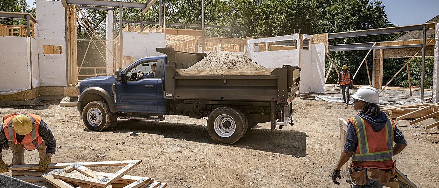 2023 Ford Super Duty® Chassis Cab F-600 with upfit filled with dirt at construction site