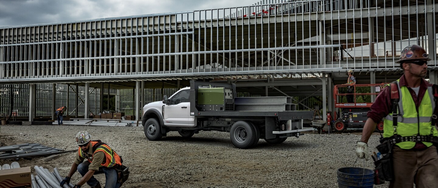 2023 Ford Super Duty® Chassis Cab with upfit parked at a job site with workers present