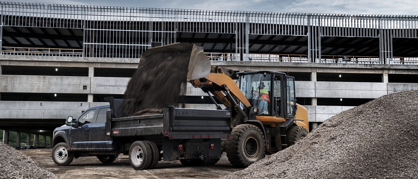 2023 Ford Super Duty® with dump truck upfit on construction site